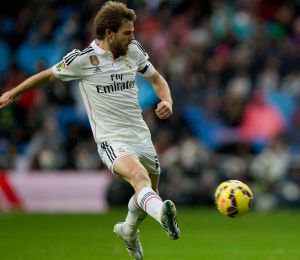MADRID, SPAIN - JANUARY 31: Sergio Canales (R) Real Sociedad de Futbol competes for the ball with Asier Illarramendi (L) of Real Madrid CF during the La Liga match between Real Madrid CF and Real Sociedad de Futbol at Estadio Santiago Bernabeu on January 31, 2015 in Madrid, Spain. (Photo by Gonzalo Arroyo Moreno/Getty Images) MADRID, SPAIN - JANUARY 31: Sergio Canales (R) Real Sociedad de Futbol competes for the ball with Asier Illarramendi (L) of Real Madrid CF during the La Liga match between Real Madrid CF and Real Sociedad de Futbol at Estadio Santiago Bernabeu on January 31, 2015 in Madrid, Spain. (Photo by Gonzalo Arroyo Moreno/Getty Images)