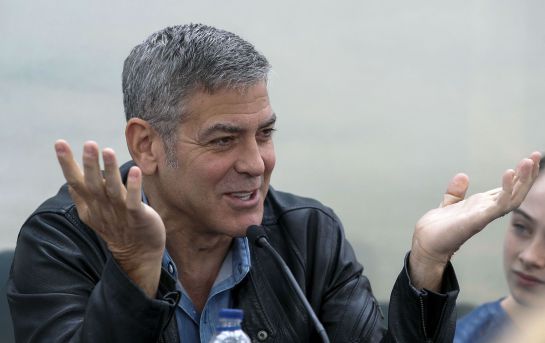 US actor George Clooney gestures during a press conference presenting his latest film 'Tomorrowland ' at the City of the Arts and Sciences in Valencia May 19,2015. AFP PHOTO / JOSE JORDAN US actor George Clooney gestures during a press conference presenting his latest film 'Tomorrowland ' at the City of the Arts and Sciences in Valencia May 19,2015. AFP PHOTO / JOSE JORDAN