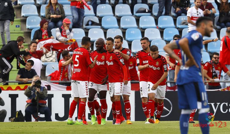 Els jugadors del Nàstic celebren el gol de l'empat d'Achille Emana. Els jugadors del Nàstic celebren el gol de l'empat d'Achille Emana.