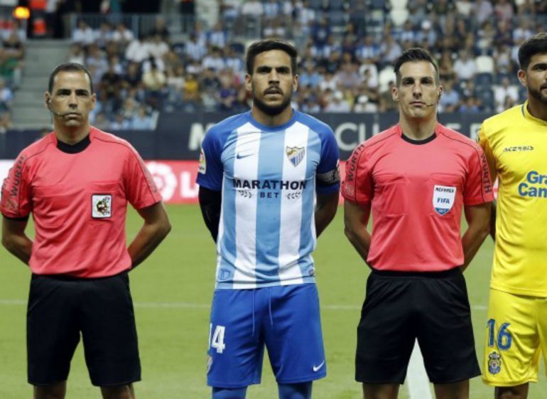 Recio, jugador del Málaga CF, recuperado para jugar ante el Atlético de Madrid en el Wanda Metropolitano: Recio llega al Wanda Metropolitano Recio, jugador del Málaga CF, recuperado para jugar ante el Atlético de Madrid en el Wanda Metropolitano: Recio llega al Wanda Metropolitano