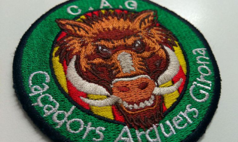 Els membres de l'associació porten aquest escut. Els membres de l'associació porten aquest escut.