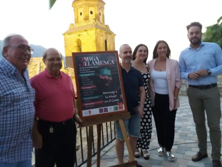 Presentación del cartel con la iglesia de la Asunción de fondo Presentación del cartel con la iglesia de la Asunción de fondo
