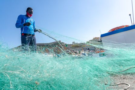 Pescadores en el puerto de Santa Lucía Pescadores en el puerto de Santa Lucía