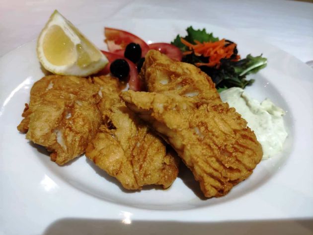 Pez cochino frito adobado con limón y ajo Pez cochino frito adobado con limón y ajo