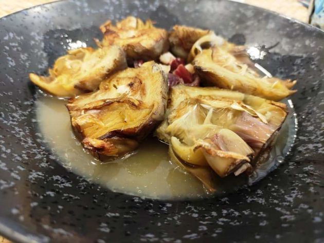Alcachofas cofitadas con infusión de ibérico Alcachofas cofitadas con infusión de ibérico