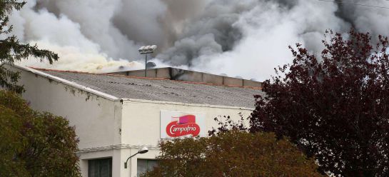 Smoke billows from the Campofrio meat factory, in the city of Burgos on November 16, 2014. The fire, thought to have been caused by a short circuit, started around 7am this morning. Although damages are extensive, no employees were reported injured. AFP PHOTO/ CESAR MANSO Smoke billows from the Campofrio meat factory, in the city of Burgos on November 16, 2014. The fire, thought to have been caused by a short circuit, started around 7am this morning. Although damages are extensive, no employees were reported injured. AFP PHOTO/ CESAR MANSO