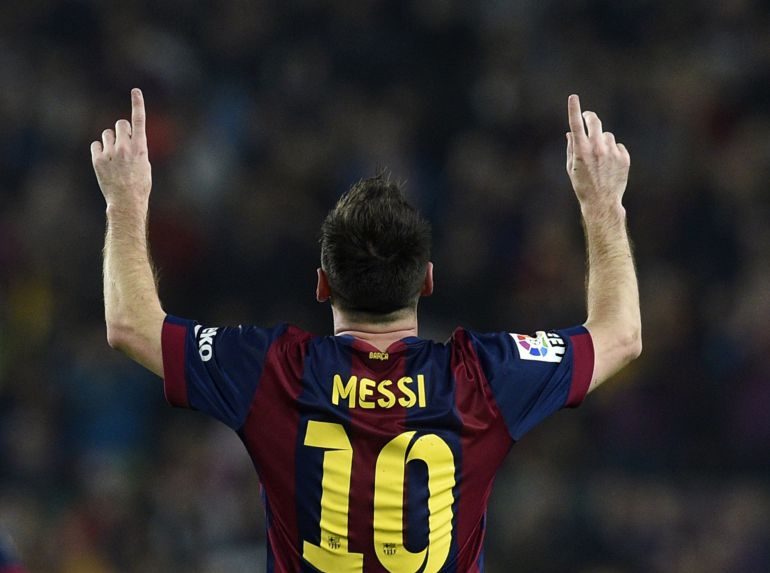 TOPSHOTS
Barcelona's Argentinian forward Lionel Messi celebrates after scoring his 251st La Liga goal during the Spanish league football match FC Barcelona vs Sevilla FC at the Camp Nou stadium in Barcelona on November 22, 2014. Lionel Messi matched a 59-year-old record with his 251st La Liga goal to equal Telmo Zarra's mark as the leading goalscorer in the history of the Spanish top flight. AFP PHOTO / LLUIS GENE TOPSHOTS
Barcelona's Argentinian forward Lionel Messi celebrates after scoring his 251st La Liga goal during the Spanish league football match FC Barcelona vs Sevilla FC at the Camp Nou stadium in Barcelona on November 22, 2014. Lionel Messi matched a 59-year-old record with his 251st La Liga goal to equal Telmo Zarra's mark as the leading goalscorer in the history of the Spanish top flight. AFP PHOTO / LLUIS GENE
