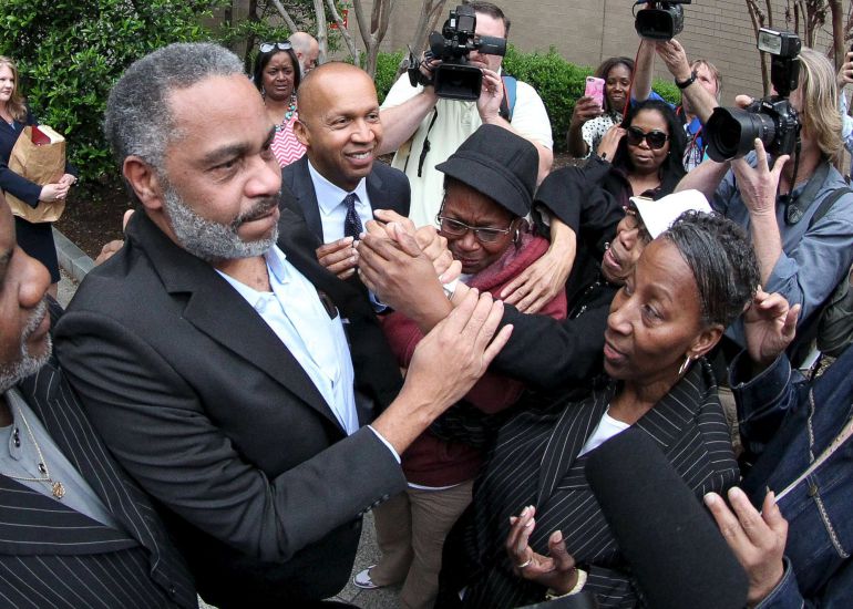 Anthony Ray Hinton is greeted by family outside the Jefferson County Jail in Birmingham, Alabama April 3, 2015. Hinton, 59, walked out of the jail a free man on Friday morning after almost 30 years on death row in Alabama for a crime he did not commit. REUTERS/Marvin Gentry Anthony Ray Hinton is greeted by family outside the Jefferson County Jail in Birmingham, Alabama April 3, 2015. Hinton, 59, walked out of the jail a free man on Friday morning after almost 30 years on death row in Alabama for a crime he did not commit. REUTERS/Marvin Gentry