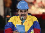 Venezuela's President Nicolas Maduro speaks during his visit to a government housing development in the state of Cojedes, in this March 30, 2015 handout picture provided by Miraflores Palace. REUTERS/Miraflores Palace/Handout via Reuters ATTENTION EDITORS - THIS PICTURE WAS PROVIDED BY A THIRD PARTY. IT IS DISTRIBUTED, EXACTLY AS RECEIVED BY REUTERS, AS A SERVICE TO CLIENTS. REUTERS IS UNABLE TO INDEPENDENTLY VERIFY THE AUTHENTICITY, CONTENT, LOCATION OR DATE OF THIS IMAGE. FOR EDITORIAL USE ONLY. NOT FOR SALE FOR MARKETING OR ADVERTISING CAMPAIGNS.
