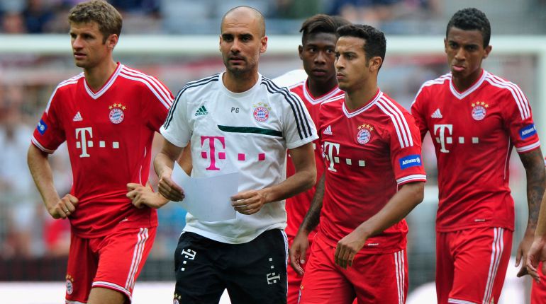 Guardiola, junto a Thiago y Müller Guardiola, junto a Thiago y Müller