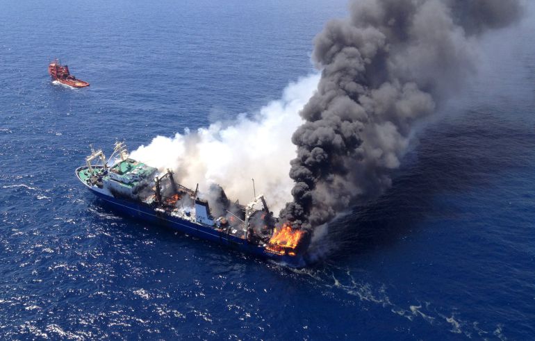 The Oleg Naydenov, a Russian fishing trawler full of fuel, which caught fire over the weekend in Gran Canaria&#039;s port of Las Palmas, can be seen in this handout picture taken April 12, 2015. The fishing trawler has sunk off the coast of Gran Canaria, in the Canary Islands, sea rescue authorities said on Wednesday as they checked to see if there had been any spillage. Picture taken April 12, 2015. REUTERS/Salvamento Maritimo/Handout via Reuters
 
 ATTENTION EDITORS - THIS IMAGE WAS PROVIDED BY A THIRD PARTY. FOR EDITORIAL USE ONLY. NOT FOR SALE FOR MARKETING OR ADVERTISING CAMPAIGNS. THIS PICTURE IS DISTRIBUTED EXACTLY AS RECEIVED BY REUTERS, AS A SERVICE TO CLIENTS 
  
  