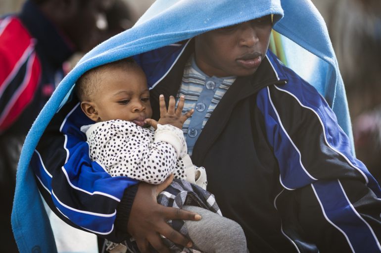 LAMPEDUSA, ITALY - APRIL 23: A migrant woman and a young child board a ship bound for Sicily on April 23, 2015 in Lampedusa, Italy. It is expected that EU leaders in Brussels are to agree later that only 5,000 resettlement places across Europe are to be offered to refugees under a new emergency summit crisis package. Hundreds of migrants continue to arrive in Lampedusa from North Africa taking advantage of calm seas. Hundreds of migrants are believed to have perished over the last week as they attempted to cross the Mediterranean from Libya to Italy in order to seek refuge. (Photo by Dan Kitwood/Getty Images) LAMPEDUSA, ITALY - APRIL 23: A migrant woman and a young child board a ship bound for Sicily on April 23, 2015 in Lampedusa, Italy. It is expected that EU leaders in Brussels are to agree later that only 5,000 resettlement places across Europe are to be offered to refugees under a new emergency summit crisis package. Hundreds of migrants continue to arrive in Lampedusa from North Africa taking advantage of calm seas. Hundreds of migrants are believed to have perished over the last week as they attempted to cross the Mediterranean from Libya to Italy in order to seek refuge. (Photo by Dan Kitwood/Getty Images)