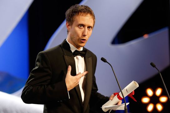 Hungarian director Laszlo Nemes talks on stage after being awarded with the Grand Jury Prize during the closing ceremony of the 68th Cannes Film Festival in Cannes, southeastern France, on May 24, 2015. AFP PHOTO / VALERY HACHE Hungarian director Laszlo Nemes talks on stage after being awarded with the Grand Jury Prize during the closing ceremony of the 68th Cannes Film Festival in Cannes, southeastern France, on May 24, 2015. AFP PHOTO / VALERY HACHE