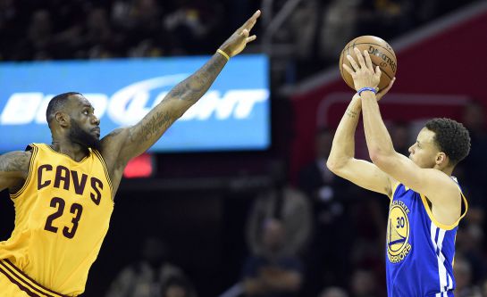 Jun 9, 2015; Cleveland, OH, USA; Golden State Warriors guard Stephen Curry (30) shoots the ball over Cleveland Cavaliers forward LeBron James (23) during the fourth quarter in game three of the NBA Finals at Quicken Loans Arena. Mandatory Credit: Bob Donnan-USA TODAY Sports Jun 9, 2015; Cleveland, OH, USA; Golden State Warriors guard Stephen Curry (30) shoots the ball over Cleveland Cavaliers forward LeBron James (23) during the fourth quarter in game three of the NBA Finals at Quicken Loans Arena. Mandatory Credit: Bob Donnan-USA TODAY Sports