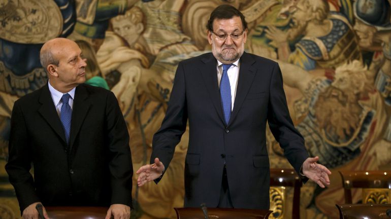Spain's Prime Minister Mariano Rajoy gestures next Spain's Culture and Sports Minister Jose Ignacio Wert (L) before the annual meeting of the Carolina Foundation at Zarzuela Palace outside Madrid, Spain, June 17, 2015. REUTERS/Juan Medina Spain's Prime Minister Mariano Rajoy gestures next Spain's Culture and Sports Minister Jose Ignacio Wert (L) before the annual meeting of the Carolina Foundation at Zarzuela Palace outside Madrid, Spain, June 17, 2015. REUTERS/Juan Medina