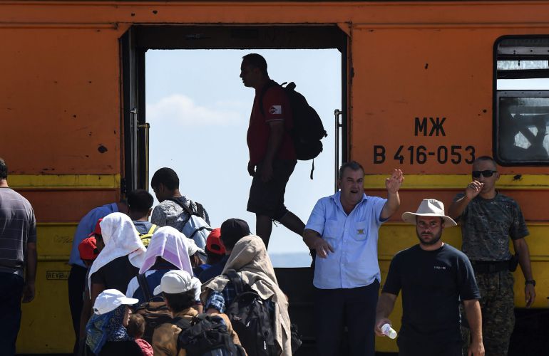 Inmigrantes se disponer a subir a un tren en Gevgelija (Macedonia) hoy 25 de agosto de 2015. Inmigrantes se disponer a subir a un tren en Gevgelija (Macedonia) hoy 25 de agosto de 2015.