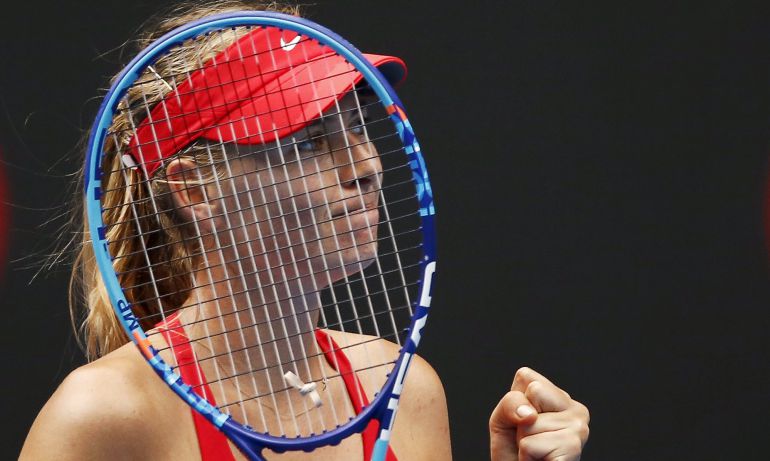 Sharapova, con su raqueta levantada Sharapova, con su raqueta levantada