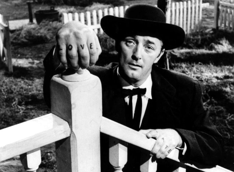 Robert Mitchum en "La noche del cazador" (Charles Laughton, 1955). Robert Mitchum en "La noche del cazador" (Charles Laughton, 1955).