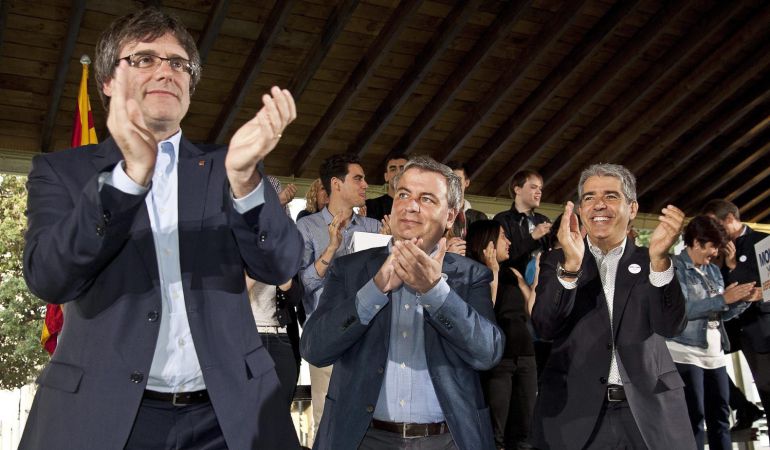 Jordi Xuclá junto a Carles Puigdemont y Francesc Homs en un acto del Partido Demócrata Catalán Jordi Xuclá junto a Carles Puigdemont y Francesc Homs en un acto del Partido Demócrata Catalán