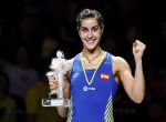NANJING, CHINA - AUGUST 05: Carolina Marin of Spain poses with her medal on the podium after defeating P.V. Sindhu of India in the women's singles final on day 7 of Total BWF World Championships at Nanjing Youth Olympic Games Sport Park on August 5, 2018 in Nanjing, China. (Photo by Lintao Zhang/Getty Images)
