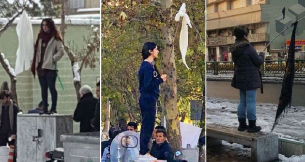 Varias mujeres se quitan el velo obligatorio en público en Teherán, Irán Varias mujeres se quitan el velo obligatorio en público en Teherán, Irán