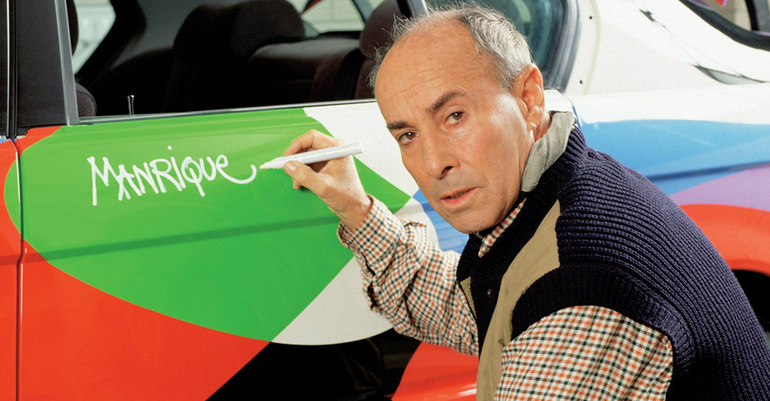 Cesar Manrique en una imagen de archivo pintando un BMW para una exposición Cesar Manrique en una imagen de archivo pintando un BMW para una exposición