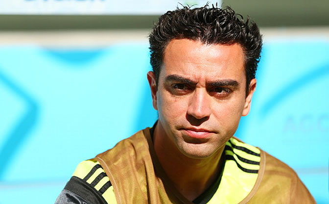 Xavi, en el banquillo durante el España-Australia del Mundial Xavi, en el banquillo durante el España-Australia del Mundial