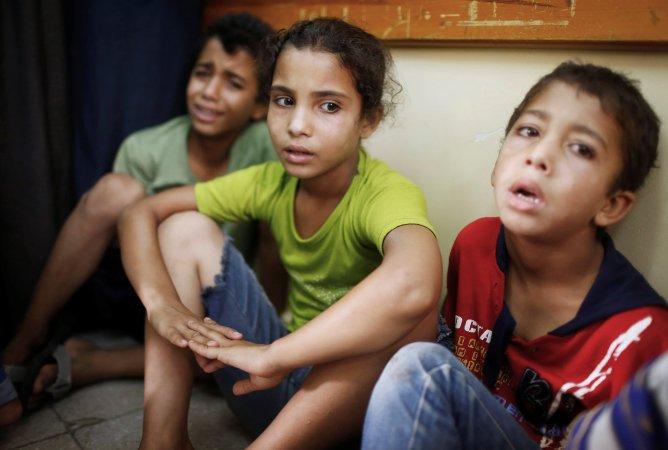 Niños palestinos en estado de shock, refugiados en un hospital de Beit Hanoun, en el norte de la Franja de Gaza Niños palestinos en estado de shock, refugiados en un hospital de Beit Hanoun, en el norte de la Franja de Gaza