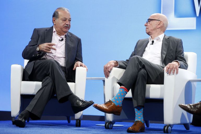 Carlos Slim (L), Lifetime Honorary Chairman, Telefonos de Mexico, speaks as Rupert Murdoch, Executive Chairman News Corp and Chairman and CEO 21st Century Fox listens, at the WSJD Live conference in Laguna Beach, California October 29, 2014. REUTERS/Lucy Nicholson (UNITED STATES - Tags: BUSINESS TELECOMS) Carlos Slim (L), Lifetime Honorary Chairman, Telefonos de Mexico, speaks as Rupert Murdoch, Executive Chairman News Corp and Chairman and CEO 21st Century Fox listens, at the WSJD Live conference in Laguna Beach, California October 29, 2014. REUTERS/Lucy Nicholson (UNITED STATES - Tags: BUSINESS TELECOMS)