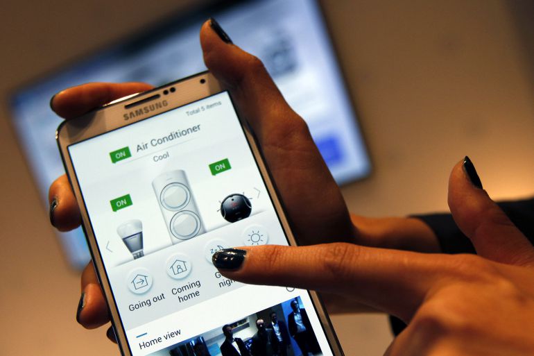 An employee demonstrates using the air conditioner control function of the Samsung Smart Home system with a smartphone at the Samsung Innovation Museum, operated by Samsung Electronics Co., in Suwon, South Korea, on Wednesday, Nov. 5, 2014. Anticipation for a restructuring of the family-run Samsung Group, whose revenues amount to about a quarter of Korea's gross domestic product, escalated after the hospitalization of 72-year-old patriarch Lee Kun Hee in May put a spotlight on the firm’s succession plans. Photographer: Woohae Cho/Bloomberg An employee demonstrates using the air conditioner control function of the Samsung Smart Home system with a smartphone at the Samsung Innovation Museum, operated by Samsung Electronics Co., in Suwon, South Korea, on Wednesday, Nov. 5, 2014. Anticipation for a restructuring of the family-run Samsung Group, whose revenues amount to about a quarter of Korea's gross domestic product, escalated after the hospitalization of 72-year-old patriarch Lee Kun Hee in May put a spotlight on the firm’s succession plans. Photographer: Woohae Cho/Bloomberg