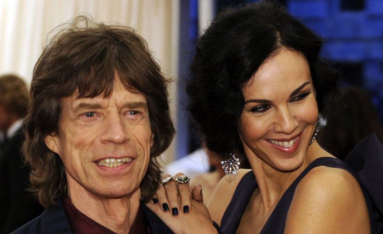 Mick Jagger junto a L'Wren Scott. Mick Jagger junto a L'Wren Scott.
