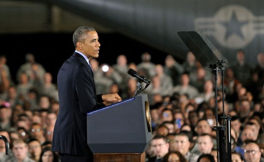 President Barack Obama speaks to members of the military during a visit to Joint Base McGuire-Dix-Lakehurst. Fort Dix, NJ, Monday, Dec. 15, 2014. (AP Photo/The Record of Bergen County, Amy Newman) President Barack Obama speaks to members of the military during a visit to Joint Base McGuire-Dix-Lakehurst. Fort Dix, NJ, Monday, Dec. 15, 2014. (AP Photo/The Record of Bergen County, Amy Newman)