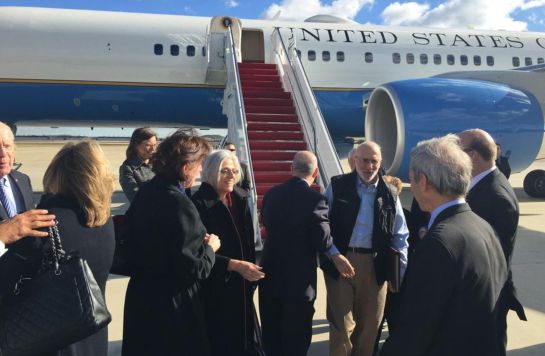 This photo courtesy of the office of US Senator Jeff Flake's(R-AZ) Twitter account, shows Alan Gross(CenterR) as he arrives from Cuba on December 17, 2014 at Andrews Air Force Base, Maryland. Cuba freed US citizen Alan Gross after five years of detention, as well as a "US intelligence asset" who the official said had been detained in Cuba for nearly 20 years. Cuba also took the rare step of releasing 53 political prisoners, a US official said Wednesday amid a historic thawing of ties announced by the two nations. AFP PHOTO/JEFF FLAKE/HANDOUT This photo courtesy of the office of US Senator Jeff Flake's(R-AZ) Twitter account, shows Alan Gross(CenterR) as he arrives from Cuba on December 17, 2014 at Andrews Air Force Base, Maryland. Cuba freed US citizen Alan Gross after five years of detention, as well as a "US intelligence asset" who the official said had been detained in Cuba for nearly 20 years. Cuba also took the rare step of releasing 53 political prisoners, a US official said Wednesday amid a historic thawing of ties announced by the two nations. AFP PHOTO/JEFF FLAKE/HANDOUT