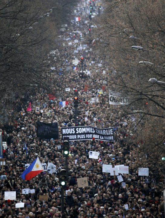 A general view shows hundreds of thousands of French citizens taking part in a solidarity march (Marche Republicaine) in the streets of Paris January 11, 2015. French citizens will be joined by dozens of foreign leaders, among them Arab and Muslim representatives, in a march on Sunday in an unprecedented tribute to this week's victims following the shootings by gunmen at the offices of the satirical weekly newspaper Charlie Hebdo, the killing of a police woman in Montrouge, and the hostage taking at a kosher supermarket at the Porte de Vincennes. REUTERS/Eric Gaillard (FRANCE - Tags: CRIME LAW POLITICS CIVIL UNREST SOCIETY) A general view shows hundreds of thousands of French citizens taking part in a solidarity march (Marche Republicaine) in the streets of Paris January 11, 2015. French citizens will be joined by dozens of foreign leaders, among them Arab and Muslim representatives, in a march on Sunday in an unprecedented tribute to this week's victims following the shootings by gunmen at the offices of the satirical weekly newspaper Charlie Hebdo, the killing of a police woman in Montrouge, and the hostage taking at a kosher supermarket at the Porte de Vincennes. REUTERS/Eric Gaillard (FRANCE - Tags: CRIME LAW POLITICS CIVIL UNREST SOCIETY)