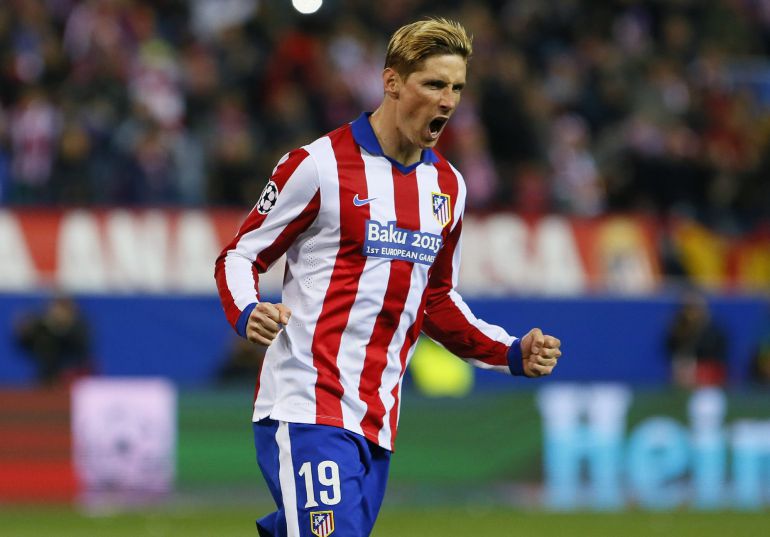 El delantero del Atlético de Madrid Fernando Torres celebra tras marcar su penalti ante el Bayer Leverkusen El delantero del Atlético de Madrid Fernando Torres celebra tras marcar su penalti ante el Bayer Leverkusen