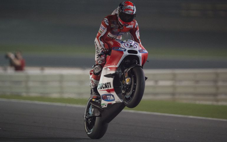 DOHA, QATAR - MARCH 27: Andrea Dovizioso of Italy and Ducati Team lifts the front wheel during the MotoGp of Qatar - Free Practice at Losail Circuit on March 27, 2015 in Doha, Qatar. (Photo by Mirco Lazzari gp/Getty Images) DOHA, QATAR - MARCH 27: Andrea Dovizioso of Italy and Ducati Team lifts the front wheel during the MotoGp of Qatar - Free Practice at Losail Circuit on March 27, 2015 in Doha, Qatar. (Photo by Mirco Lazzari gp/Getty Images)