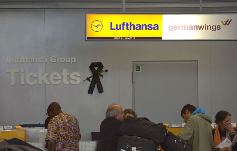 A black mourning band is seen at a ticket counter of German airline Lufthansa at the Duesseldorf airport on March 31, 2015 in Duesseldorf, western Germany. Germany will hold a national memorial ceremony and service for victims of a Germanwings flight that crashed in the French Alps, killing all 150 aboard, on April 17, regional authorities said. AFP PHOTO / SASCHA SCHUERMANN A black mourning band is seen at a ticket counter of German airline Lufthansa at the Duesseldorf airport on March 31, 2015 in Duesseldorf, western Germany. Germany will hold a national memorial ceremony and service for victims of a Germanwings flight that crashed in the French Alps, killing all 150 aboard, on April 17, regional authorities said. AFP PHOTO / SASCHA SCHUERMANN