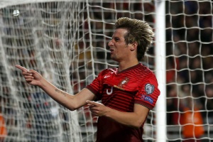 Portugal's Fabio Coentrao celebrates his goal against Serbia during their Euro 2016 qualifier soccer match at Luz stadium in Lisbon March 29, 2015. REUTERS/Rafael Marchante Portugal's Fabio Coentrao celebrates his goal against Serbia during their Euro 2016 qualifier soccer match at Luz stadium in Lisbon March 29, 2015. REUTERS/Rafael Marchante