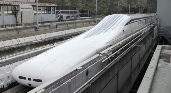 Central Japan Railway's seven-car maglev -- short for "magnetic levitation" -- train returns to the station after setting a new world speed record in a test run near Mount Fuji, clocking more than 600 kilometres (373 miles) an hour on April 21, 2015. The new record came less than a week after the company clocked 590kph, by breaking its own 2003 record of 581 kph. AFP PHOTO / JIJI PRESS ==JAPAN OUT== Central Japan Railway's seven-car maglev -- short for "magnetic levitation" -- train returns to the station after setting a new world speed record in a test run near Mount Fuji, clocking more than 600 kilometres (373 miles) an hour on April 21, 2015. The new record came less than a week after the company clocked 590kph, by breaking its own 2003 record of 581 kph. AFP PHOTO / JIJI PRESS ==JAPAN OUT==