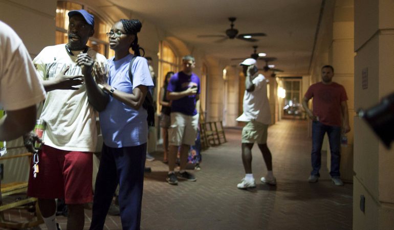 People concerned about relatives seek information from police nearby the scene of a shooting at the Emanuel AME Church in Charleston, South Carolina, June 17, 2015. A gunman opened fire on Wednesday evening at the historic African-American church in downtown Charleston. REUTERS/Randall Hill People concerned about relatives seek information from police nearby the scene of a shooting at the Emanuel AME Church in Charleston, South Carolina, June 17, 2015. A gunman opened fire on Wednesday evening at the historic African-American church in downtown Charleston. REUTERS/Randall Hill