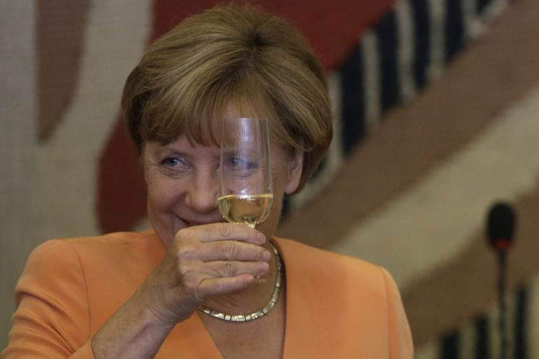 La canciller alemana, Ángela Merkel, brinda durante un almuerzo en el Palacio de Itamaraty, en Brasilia. La canciller alemana, Ángela Merkel, brinda durante un almuerzo en el Palacio de Itamaraty, en Brasilia.
