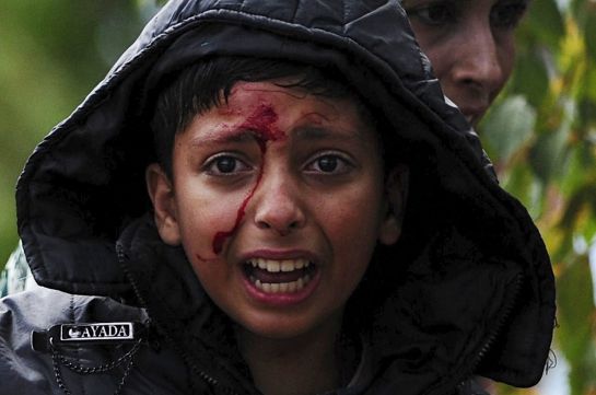 A girl cries after crossing Greece's border into Macedonia near Gevgelija, Macedonia, August 22, 2015. Thousands of migrants stormed across Macedonia's border on Saturday, overwhelming security forces who threw stun grenades and lashed out with batons in an increasingly futile bid to stem their flow through the Balkans to western Europe. Some had spent days in the open with little or no access to food or water after Macedonia on Thursday declared a state of emergency and sealed its borders to migrants, many of them refugees from war in Syria and other conflicts in the Middle East. REUTERS/Ognen Teofilovski A girl cries after crossing Greece's border into Macedonia near Gevgelija, Macedonia, August 22, 2015. Thousands of migrants stormed across Macedonia's border on Saturday, overwhelming security forces who threw stun grenades and lashed out with batons in an increasingly futile bid to stem their flow through the Balkans to western Europe. Some had spent days in the open with little or no access to food or water after Macedonia on Thursday declared a state of emergency and sealed its borders to migrants, many of them refugees from war in Syria and other conflicts in the Middle East. REUTERS/Ognen Teofilovski