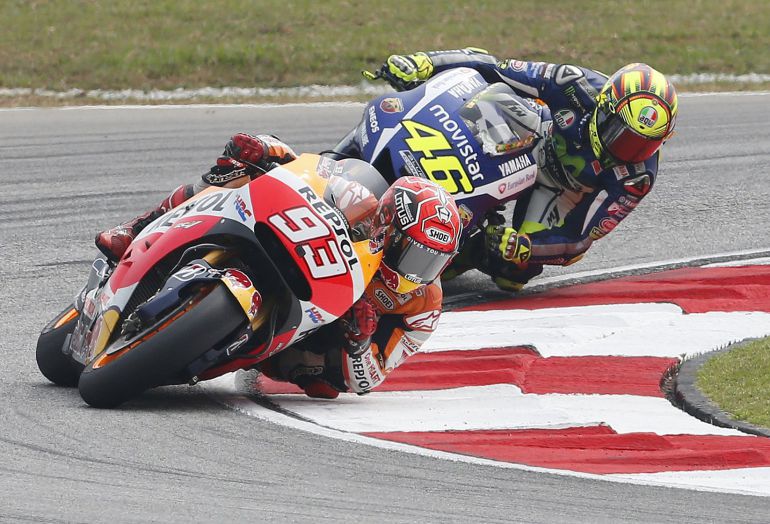 Marc Marquez (front) y Valentino Rossi. Marc Marquez (front) y Valentino Rossi.