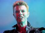 British rock-singer David Bowie performs during the first day of the Doctor Music Festival in a Pirineos little valley in Catalonia July 12, 1996 file photo. Singer Bowie has died after an 18-month battle with cancer, his official Twitter account announced on January 11, 2016. REUTERS/Gustau Nacarino/Files