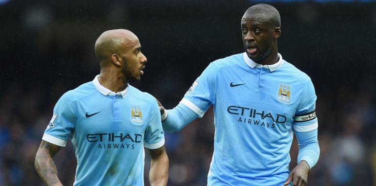 Yaya Toure con Fabian Delph Yaya Toure con Fabian Delph