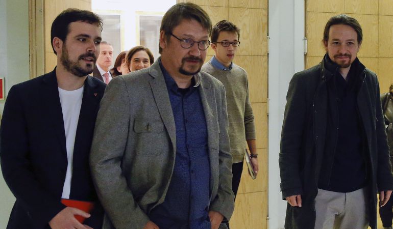 El líder de Podemos, Pablo Iglesias; el portavoz en el Congreso de la formación, Ínigo Errejón; el portavoz de En Comú Podem, Xavier Domènech, y el portavoz de IU, Alberto Garzón (d-i), en una foto de archivo. El líder de Podemos, Pablo Iglesias; el portavoz en el Congreso de la formación, Ínigo Errejón; el portavoz de En Comú Podem, Xavier Domènech, y el portavoz de IU, Alberto Garzón (d-i), en una foto de archivo.