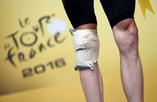 Las piernas de Froome en el pódium. Las piernas de Froome en el pódium.
