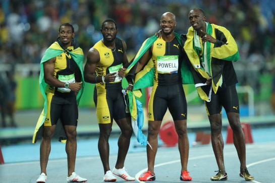 RIO DE JANEIRO, BRAZIL - AUGUST 19: Usain Bolt of Jamaica celebrates with teammates Asafa Powell, Yohan Blake and Nickel Ashmeade after winning the Men's 4 x 100m Relay Final on Day 14 of the Rio 2016 Olympic Games at the Olympic Stadium on August 19, 2016 in Rio de Janeiro, Brazil. (Photo by Ian MacNicol/Getty Images) RIO DE JANEIRO, BRAZIL - AUGUST 19: Usain Bolt of Jamaica celebrates with teammates Asafa Powell, Yohan Blake and Nickel Ashmeade after winning the Men's 4 x 100m Relay Final on Day 14 of the Rio 2016 Olympic Games at the Olympic Stadium on August 19, 2016 in Rio de Janeiro, Brazil. (Photo by Ian MacNicol/Getty Images)