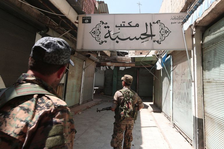 Syria Democratic Forces (SDF) fighters inspect a centre that was used by Islamic State religious police (al-Hisbah) in Manbij, Aleppo Governorate, Syria, August 16, 2016. REUTERS Rodi Said Syria Democratic Forces (SDF) fighters inspect a centre that was used by Islamic State religious police (al-Hisbah) in Manbij, Aleppo Governorate, Syria, August 16, 2016. REUTERS Rodi Said