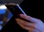 A woman uses her mobile phone in a cafe in Riyadh, Saudi Arabia October 6, 2016. Picture taken October 6, 2016. REUTERS/Faisal Al Nasser